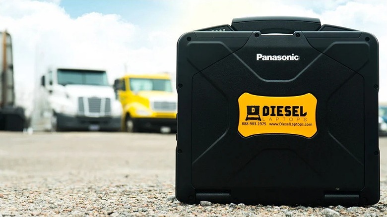 A Diesel Laptop briefcase placed on a rocky terrain.