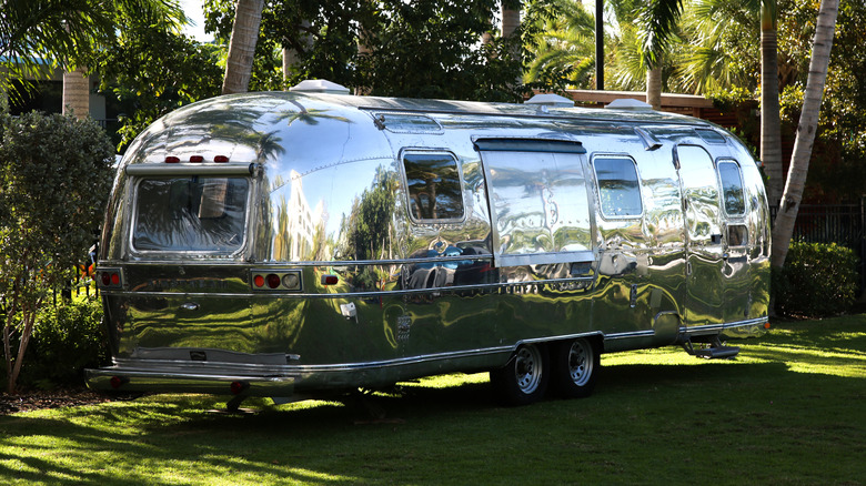 Airstream trailer parked at a campground