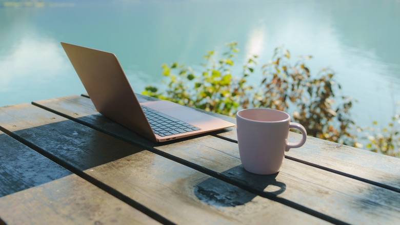 Laptop on a table at a remote campground