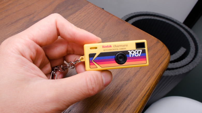 Person holding a kodak charmera keychain camera