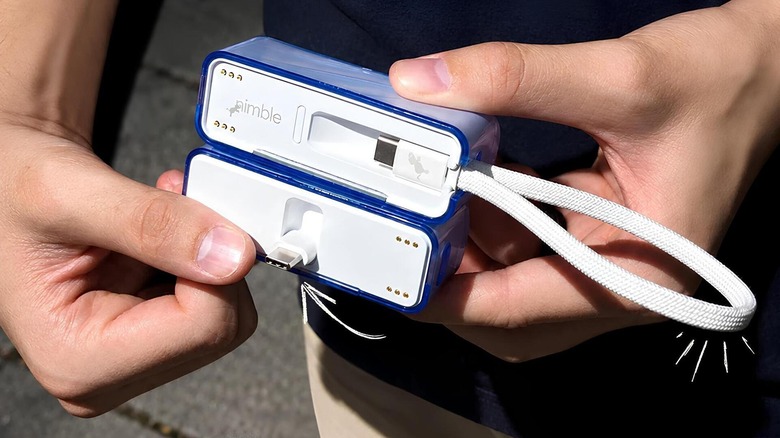 Man holding two power banks together