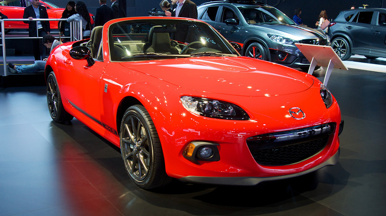 A Mazda Miata on a showroom floor at the Los Angeles Auto Show