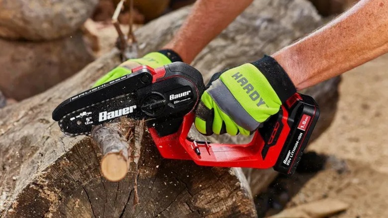 cutting branches with Bauer pruning saw