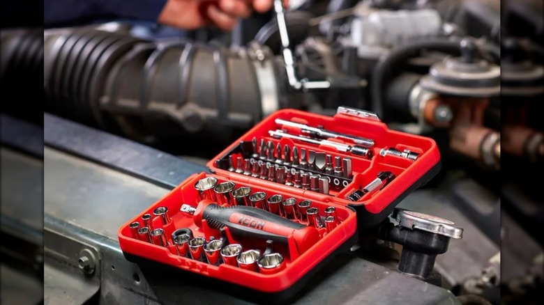 Icon socket set resting on a car