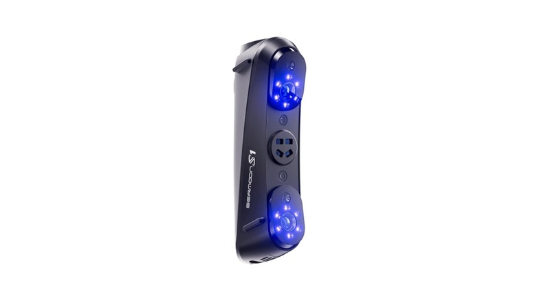 Black elongated device with blue laser lights on the top and bottom