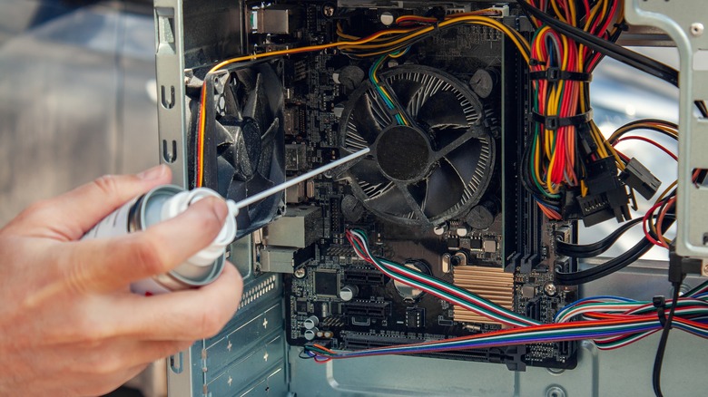 using compressed air to clean pc