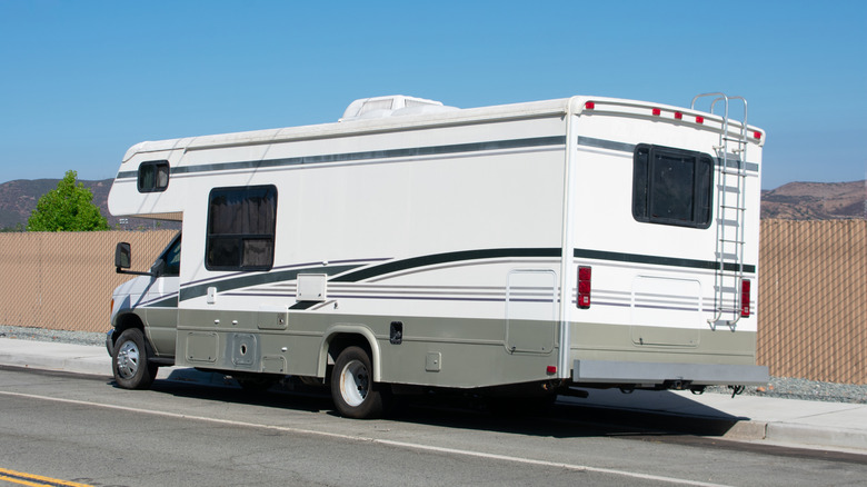 Rear of RV with ladder attached
