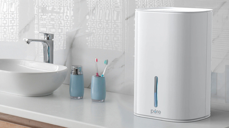 Miniature dehumidifier on countertop