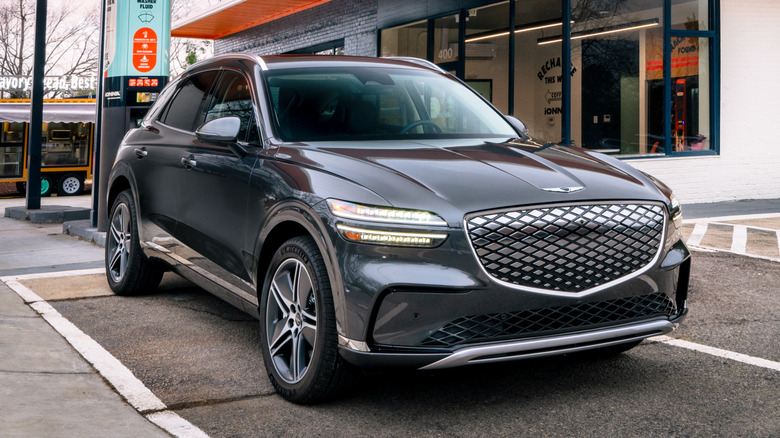 Genesis Electrified GV70 at a charging station