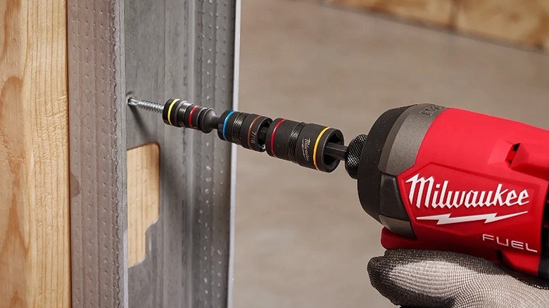 A multi-nut driver used to drive a fastener into wood.