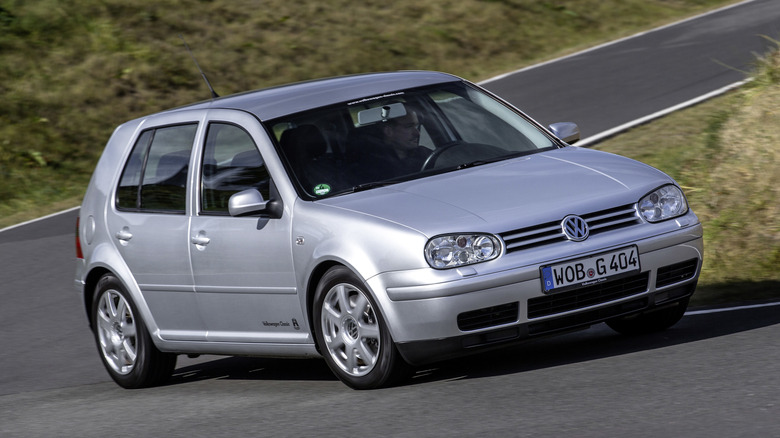 Fourth generation VW Golf cornering at speed