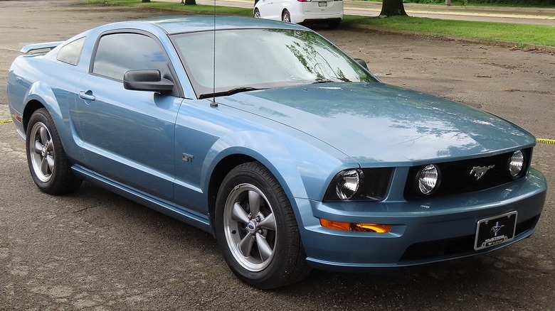 Blue 2005 Ford Mustang in parking lot