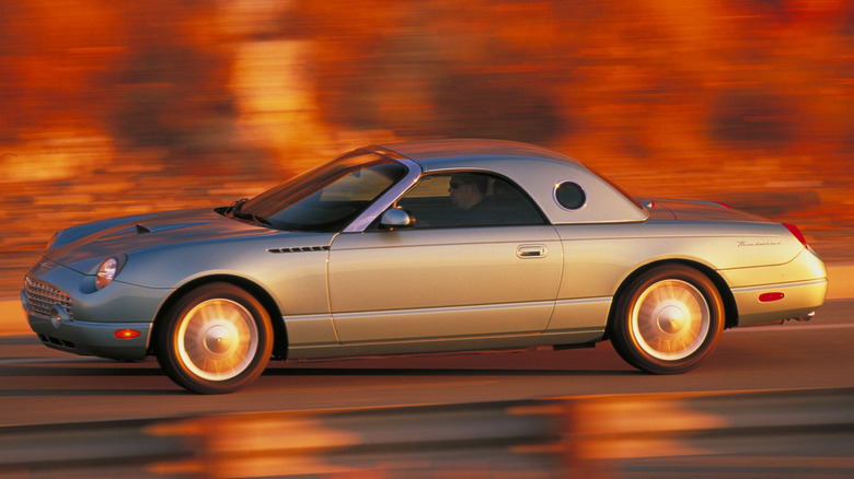 New Ford Thunderbird driving along a road