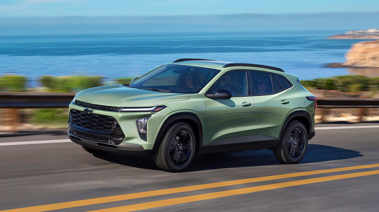 A green 2026 Chevrolet Trax driving