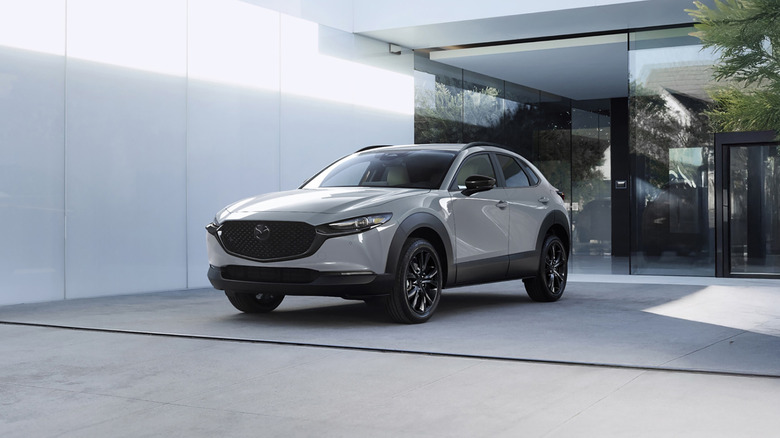 A white 2026 Mazda CX-30 parked in a garage