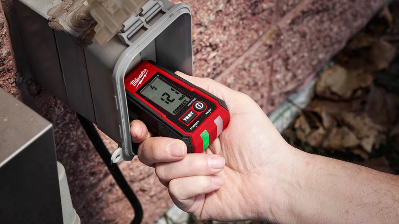 A voltage detector kit in an outlet.