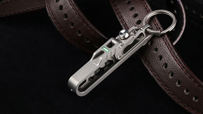 The K-Smart X attached to the side a belt loop
