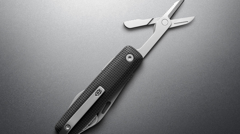 The Helton with the scissors out from the handle