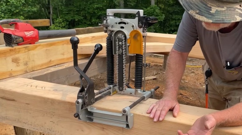 Makita chain mortiser on wood beam