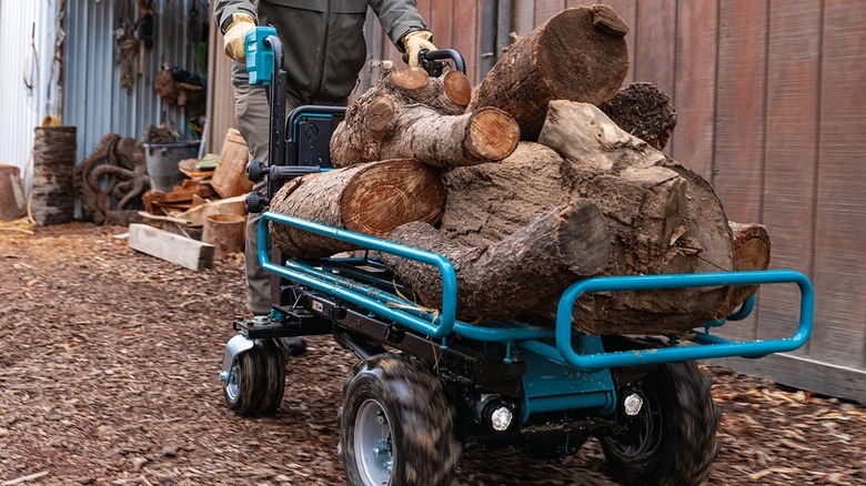 Person using Makita material handling frame