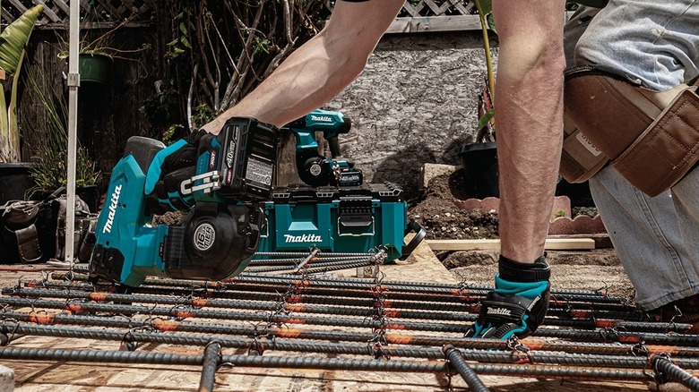 Person using Makita rebar tying machine