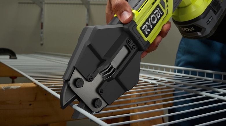 Ryobi power cutter cutting wire shelving.