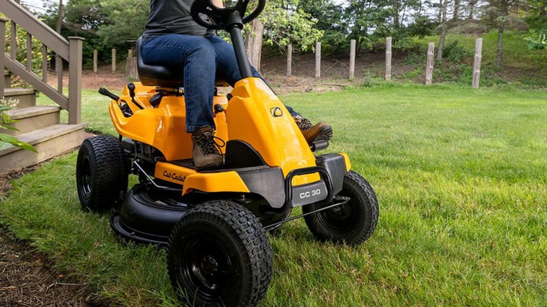 mowing lawn with Cub Cadet riding mower