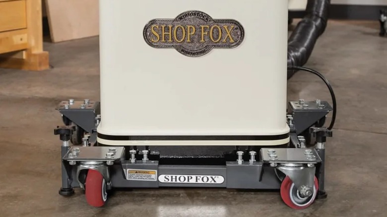 Shop Fox mini mobile base carrying a workshop tool