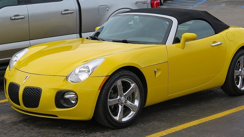 A yellow Pontiac Solstice GXP