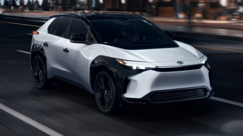A 2025 Toyota bZ4X on a street at night
