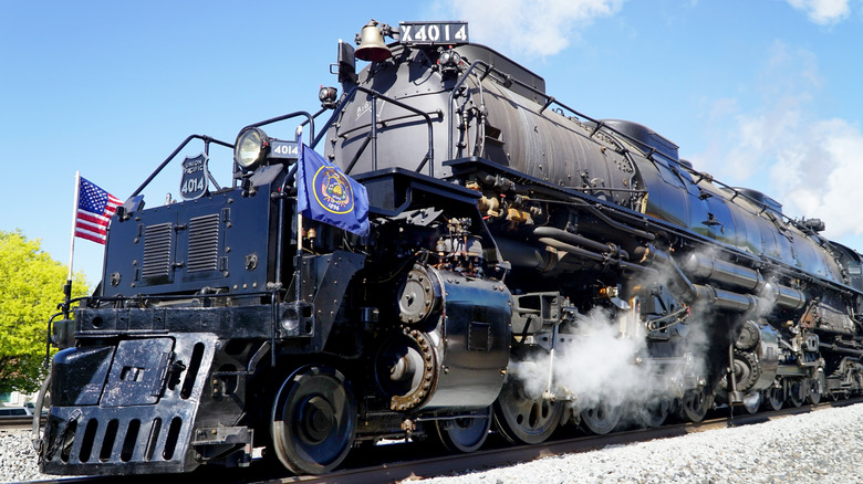 Union Pacific 4014 departing on a sunny day