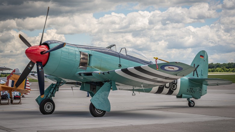 While there was a concerted effort toward the building of jet aircraft after WWII, piston-powered fighters continued in service for many years. An example of one of these aircraft that saw its initial development during wartime but production commencing after the war is the Hawker Sea Fury. Plans for an aircraft were developed in 1943 using the Hawker Typhoon and Tempest as a base for the new model, but the Royal Air Force canceled its order upon the close of the war. The Royal Navy saw a need to replace its aging carrier-based aircraft and placed an order for the new Fury aircraft, which would have its name changed to Sea Fury.  The Sea Fury was the last propeller-driven aircraft to be used by the Royal Navy, and it performed well during the Korean War, even when going up against and downing a fearsome MiG-15 Soviet fighter jet, the only British aerial kill of the conflict. Sea Furies were retired toward the end of the '50s, but many made their way into civilian hands. Airworthy copies are quite valuable today, with one available at the time of writing for $1.7 million.
