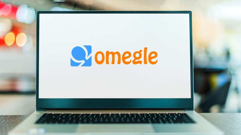 The Omegle logo on a laptop