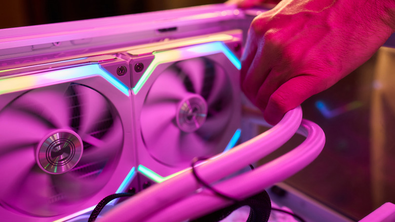 Person installing CPU radiator