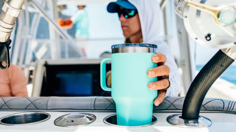 The Yeti Rambler Travel Mug placed in a cupholder