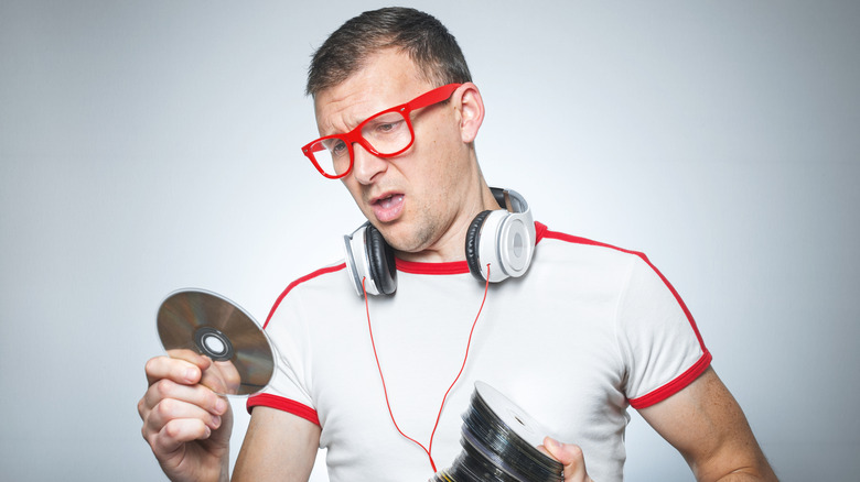 man with CDs