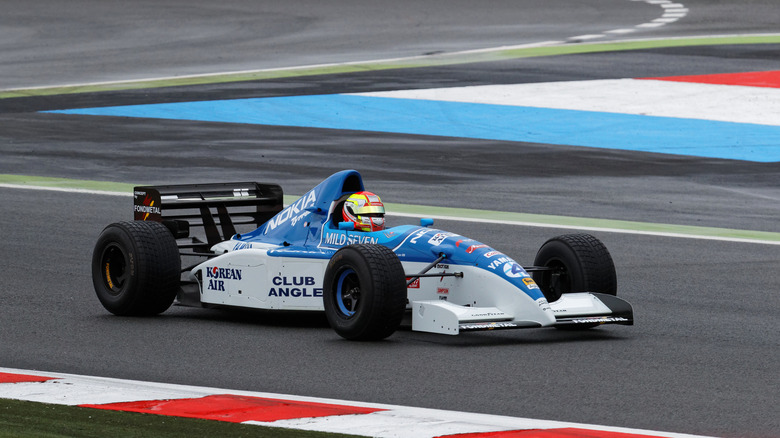 A Yamaha-Tyrrell Formula 1 car in a Grand Prix
