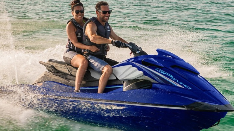 Two people riding the Yamaha GP SVHO
