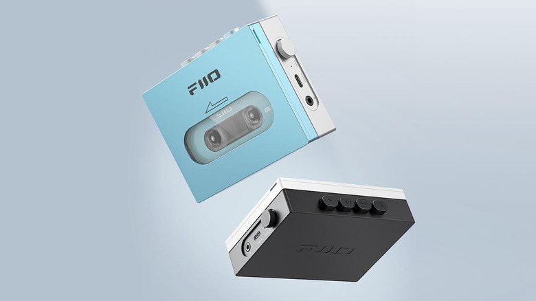 A light blue and a black FiiO CP13 Cassette Player floating on a bluish-white background
