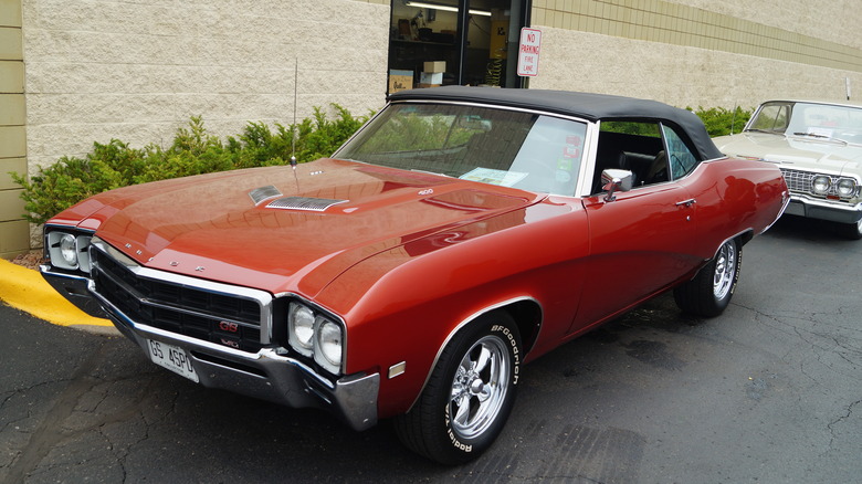 A red 1969 Buick Gran Sport 455 15th Annual TSI/Smith Nielsen Automotive Car Show Brooklyn Park, MInnesota