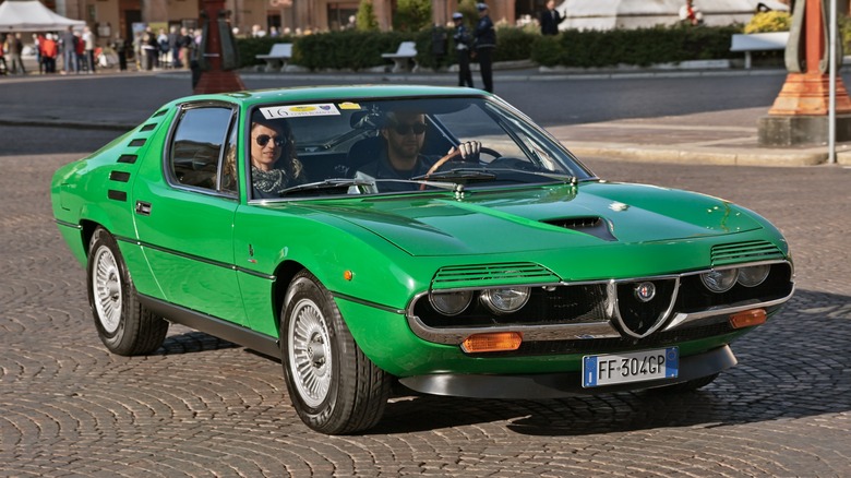 A green color 1972 Alfa Romeo Montreal