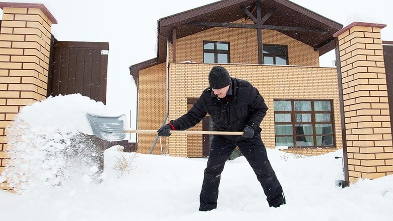 Person shoveling snow