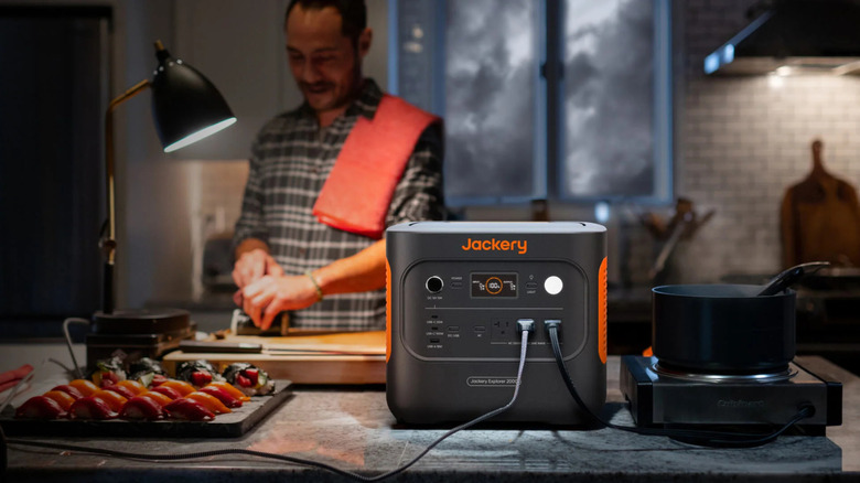 Person cooking with Jackery battery backup