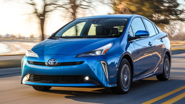 Blue 2020 Toyota Prius on road