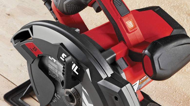 A closeup of the Skil Circular Saw with Laser on a wooden surface