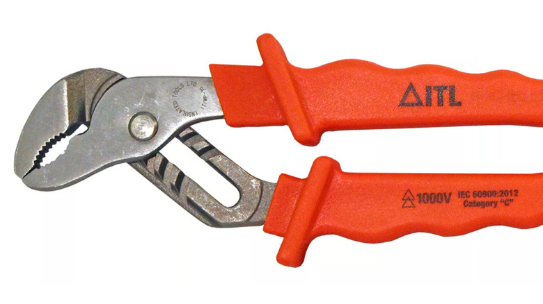 Closeup of orange and silver Jameson insulated pump pliers showing voltage rating