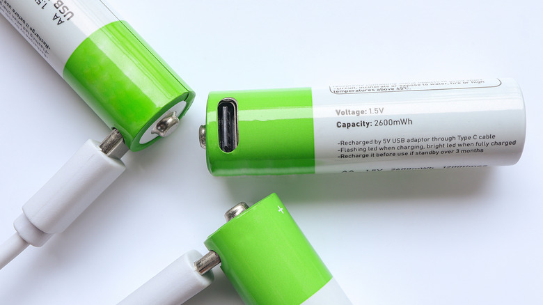A trio of USB-C AA batteries connected to a charging cable