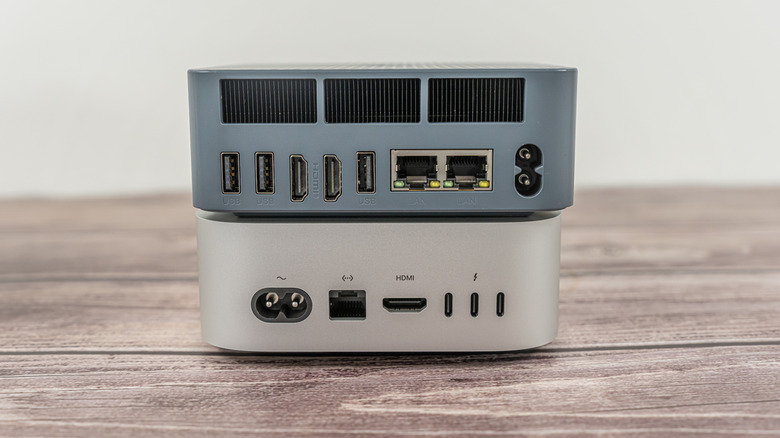 A Windows mini PC on top of a Mac mini