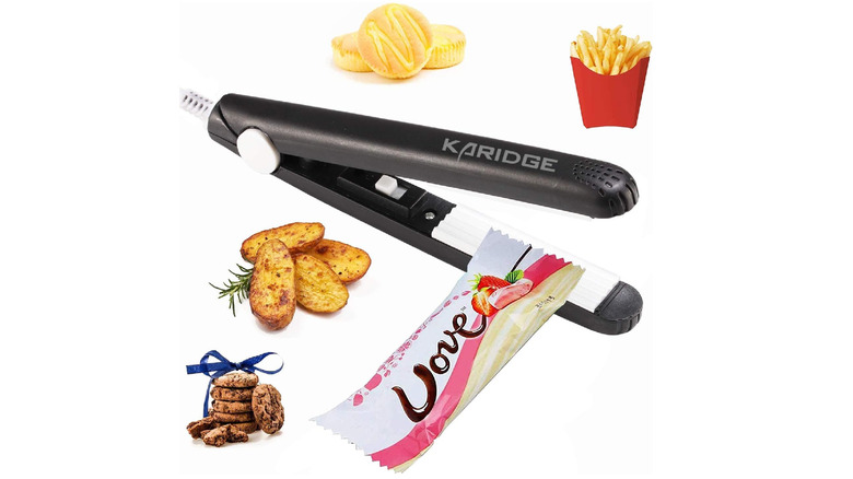 The Karidge Chip Bag Sealer sealing a candy bar wrapper on a white background, with a bunch of snacks around it on a white background