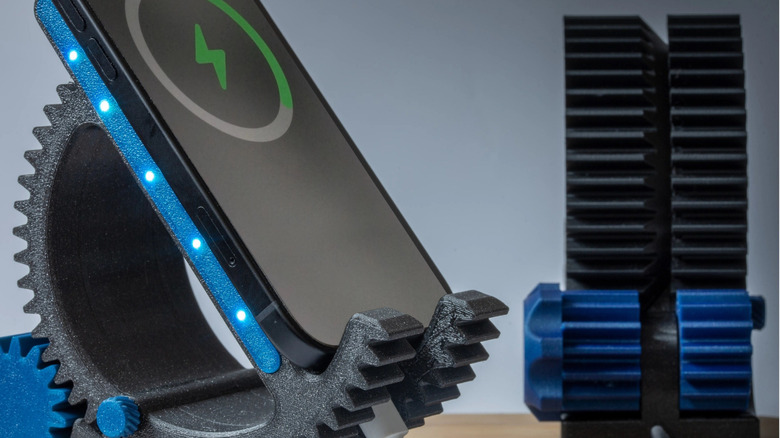 A phone charging on a 3D-printed phone stand